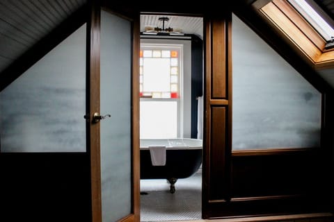 Standard Suite, 1 Queen Bed | Bathroom | Hair dryer, bathrobes, towels, soap