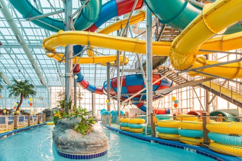 4 indoor pools, open 4:00 PM to 9:00 PM, pool umbrellas