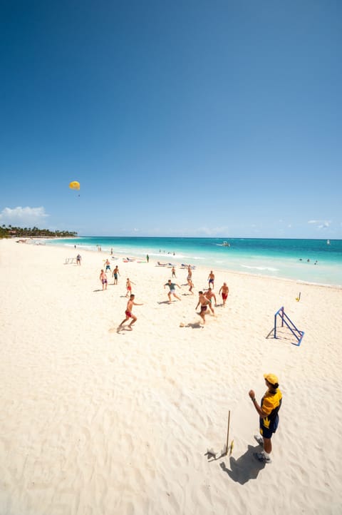 On the beach, beach umbrellas, beach towels, beach massages
