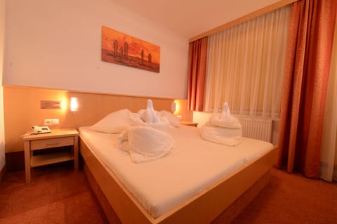 Hypo-allergenic bedding, minibar, in-room safe, individually decorated