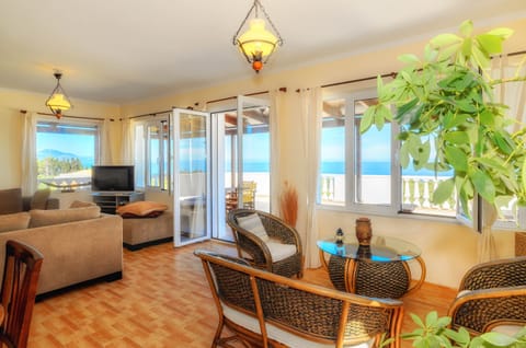 Apartment, 3 Bedrooms, Sea View | Living area | 20-inch TV with cable channels