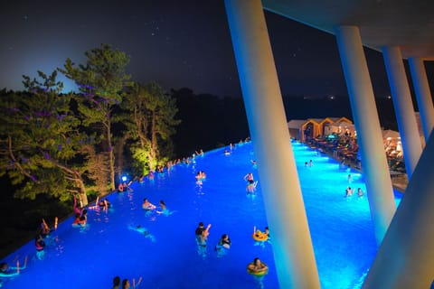 Outdoor pool, open 9:00 AM to 10:00 PM, sun loungers