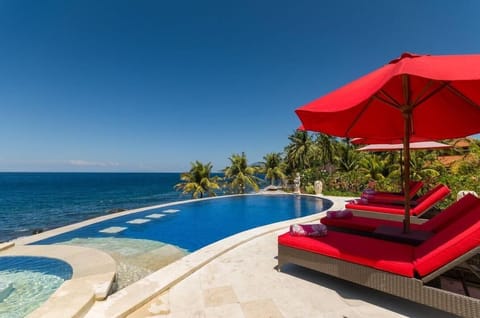 Outdoor pool, pool umbrellas, sun loungers