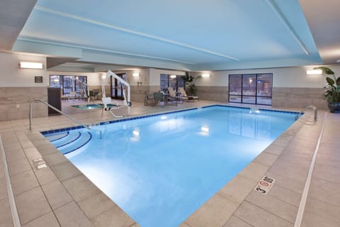 Indoor pool, open 6 AM to 11 PM, sun loungers