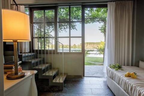 Suite, 2 Bedrooms, Lake View | Minibar, in-room safe, desk, soundproofing