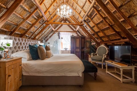 Deluxe Room | Premium bedding, minibar, in-room safe, individually decorated