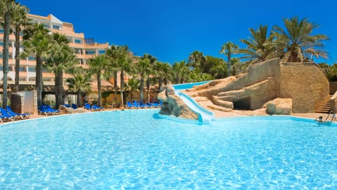 Indoor pool, outdoor pool, pool umbrellas, sun loungers