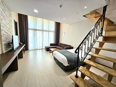Deluxe Duplex | Premium bedding, down comforters, minibar (free items), in-room safe