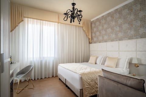 Deluxe Double or Twin Room | Down comforters, minibar, in-room safe, desk