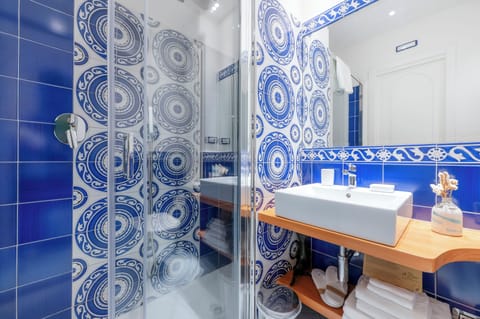 Superior Double or Twin Room, Terrace, Sea View | Bathroom | Shower, rainfall showerhead, free toiletries, hair dryer