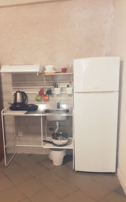 Family Apartment, 2 Bedrooms | Private kitchen | Fridge, stovetop, electric kettle, cookware/dishes/utensils