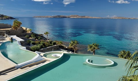 Outdoor pool, pool umbrellas, sun loungers