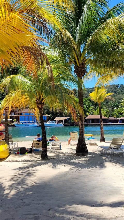 Private beach, white sand, sun loungers, beach towels