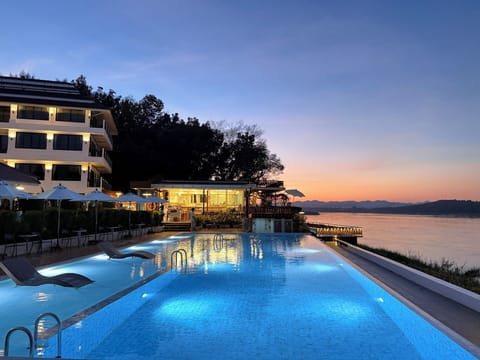 Outdoor pool, open 8:00 AM to 8:00 PM, pool umbrellas, sun loungers