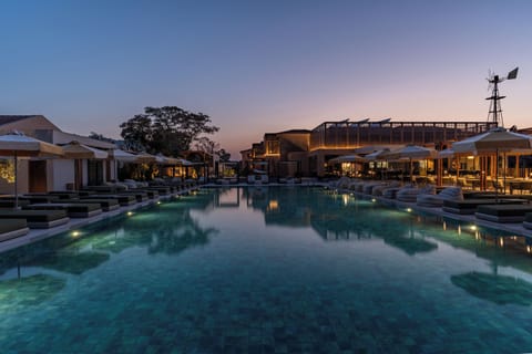 Outdoor pool, pool umbrellas, sun loungers