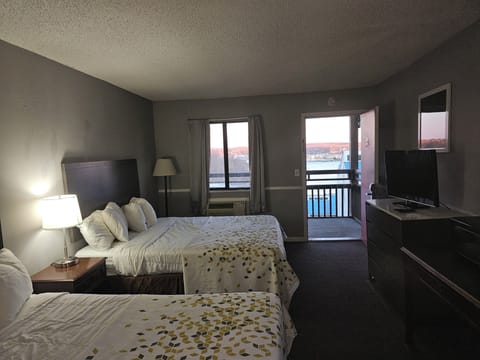 Standard Room, 2 Queen Beds, Lake View | Iron/ironing board, free WiFi, bed sheets
