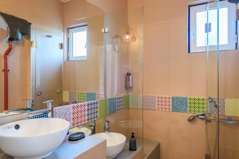 Shower, free toiletries, hair dryer, bathrobes