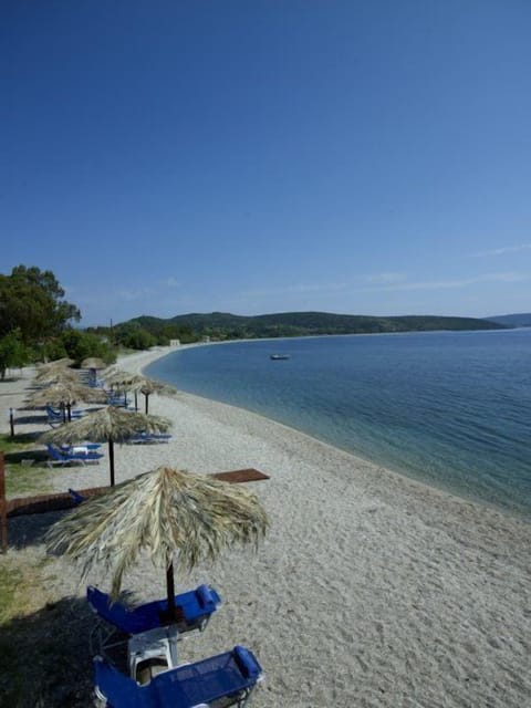 On the beach, sun loungers, beach umbrellas, beach volleyball