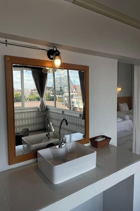 Premium Quadruple Room | Minibar, individually decorated, individually furnished, desk
