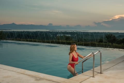 Outdoor pool, open 8:00 AM to 9:30 PM, pool umbrellas, sun loungers