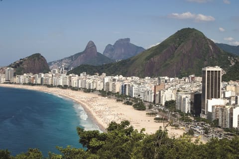 Beach nearby, white sand, beach towels