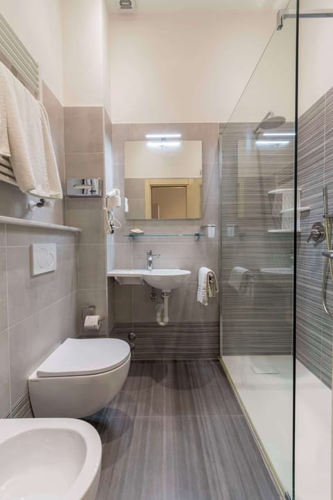 Shower, free toiletries, bathrobes, bidet