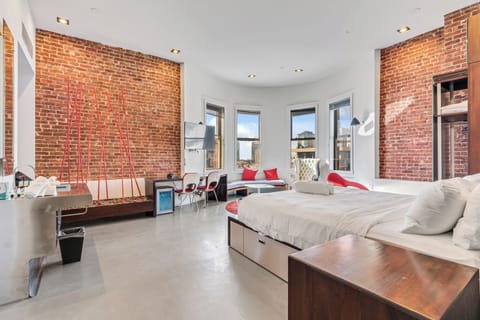 Superior Room, 1 King Bed, Private Bathroom, City View (Self check-in) | Desk, laptop workspace, blackout drapes, iron/ironing board