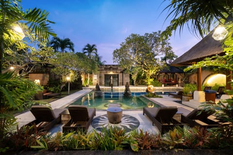 2 outdoor pools, open 7:00 AM to 10:00 PM, pool umbrellas, sun loungers