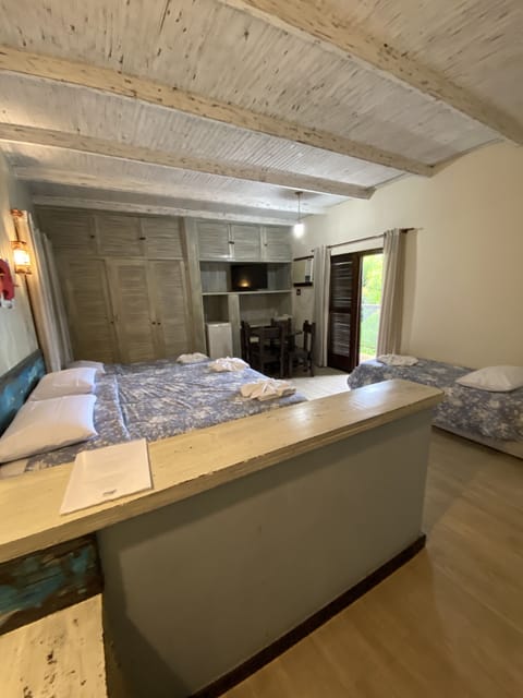 Quadruple Room | Minibar, in-room safe, blackout drapes, iron/ironing board