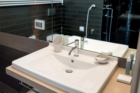 Shower, free toiletries, hair dryer, slippers