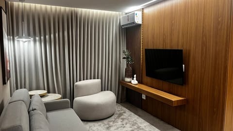 Premium Suite | Living area | TV
