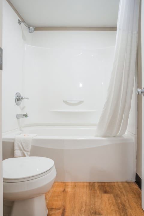 Room, 2 Queen Beds, Non Smoking (Oversized Room) | Bathroom | Combined shower/tub, hair dryer, towels