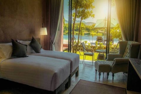 Deluxe River View Room | Premium bedding, minibar, desk, laptop workspace