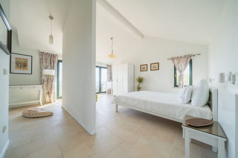 Panoramic Studio Suite, Sea View | 1 bedroom, down comforters, individually decorated