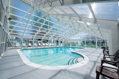 Indoor pool, outdoor pool, open 9:00 AM to 10:00 PM, pool umbrellas