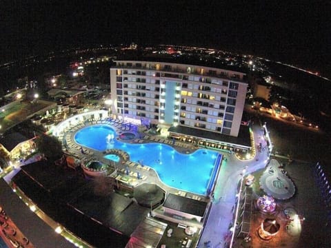 Indoor pool, seasonal outdoor pool, pool umbrellas, sun loungers