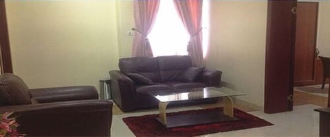 Family Suite, 2 Bedrooms, City View | Living area | Flat-screen TV