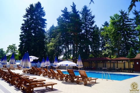 Seasonal outdoor pool, open 9 AM to 5:30 PM, sun loungers