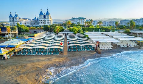Private beach, sun loungers, beach bar