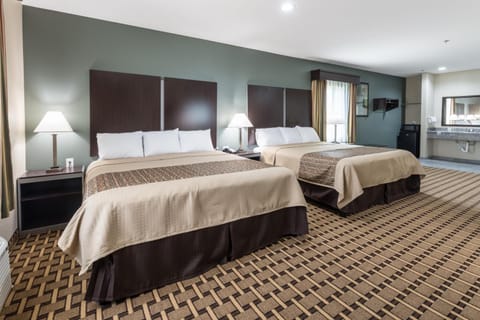 Premium bedding, memory foam beds, desk, blackout drapes