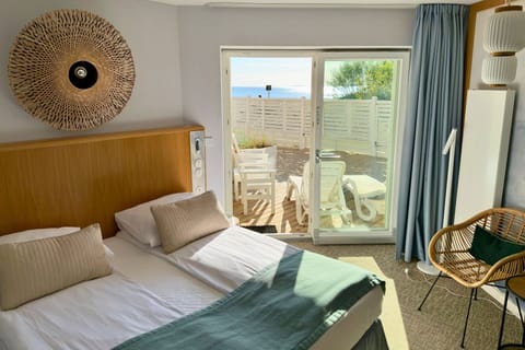 Deluxe Double Room | In-room safe, desk, laptop workspace, blackout drapes