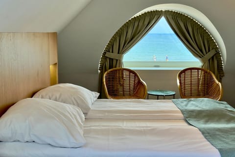 Deluxe Studio Suite, Balcony, Sea View | In-room safe, desk, laptop workspace, blackout drapes