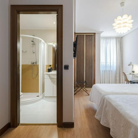 Standard Double Room | Bathroom | Shower, hair dryer, towels, soap