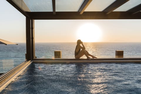 Indoor pool, outdoor pool, pool umbrellas, sun loungers