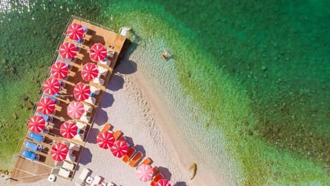 On the beach, sun loungers, beach umbrellas, snorkeling