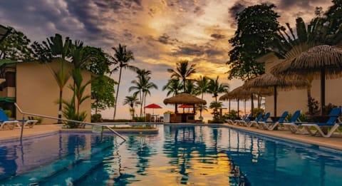 Outdoor pool, open 8:00 AM to 9:00 PM, pool umbrellas, sun loungers
