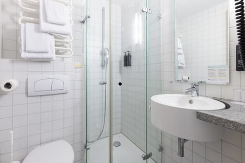 Shower, free toiletries, hair dryer, towels