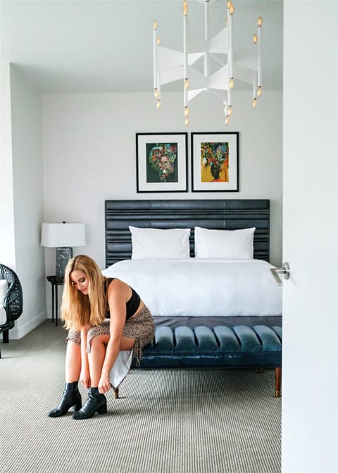 Premium bedding, down comforters, free minibar items, in-room safe