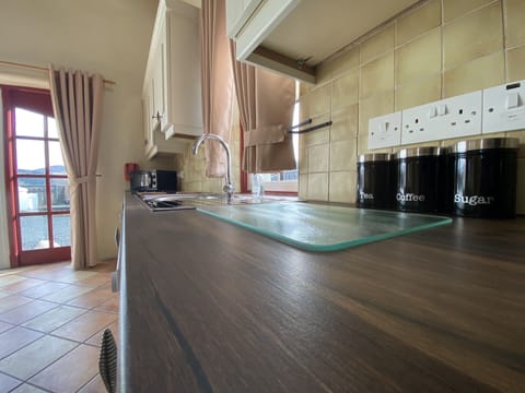 Cottage, 3 Bedrooms (Jimmy's Cottage) | Private kitchen | Full-size fridge, microwave, oven, electric kettle