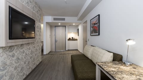 Suite, 1 King Bed | In-room safe, desk, soundproofing, iron/ironing board